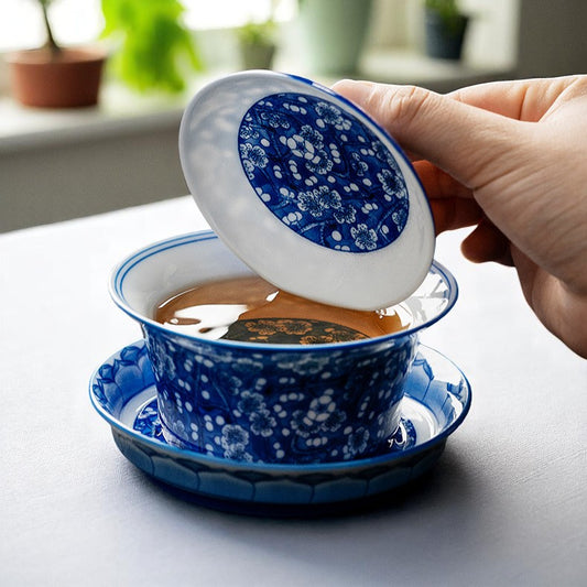 Opening lid of ice plum gaiwan for solo gongfu tea session