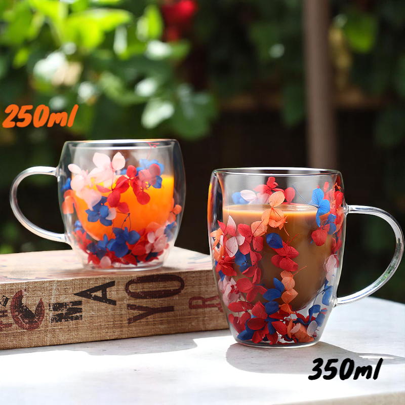 250ml and 350ml glass mugs with dried blossoms, outdoor tea setup