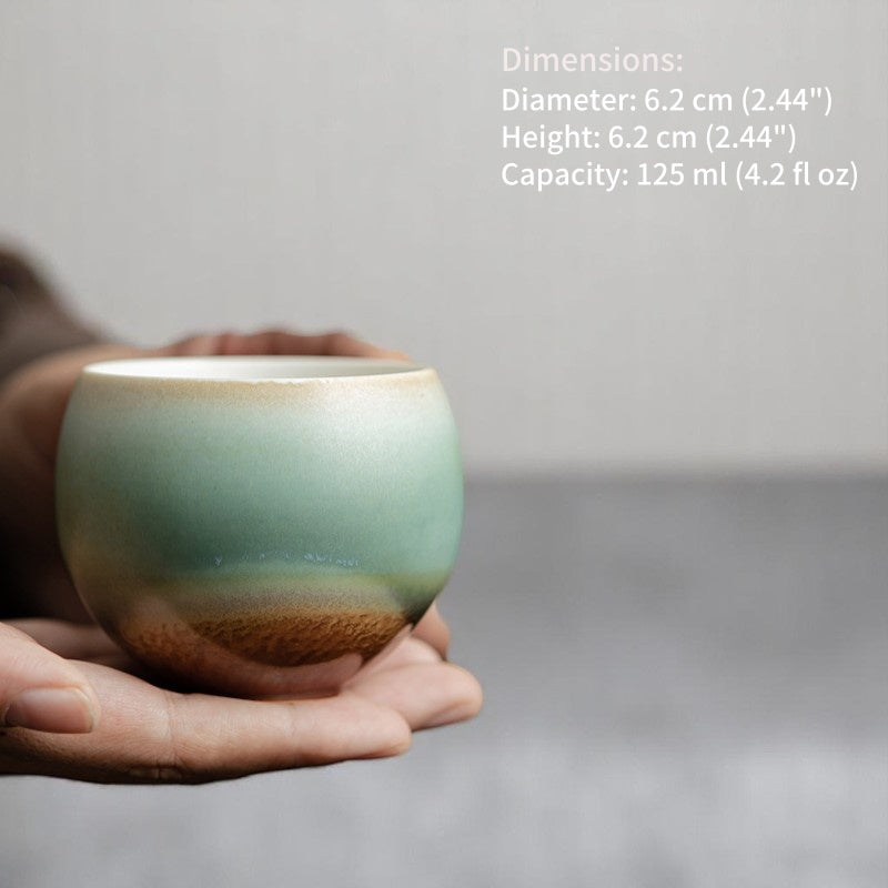 Palm-sized teacup with misty glaze, ideal for mindful tea moments