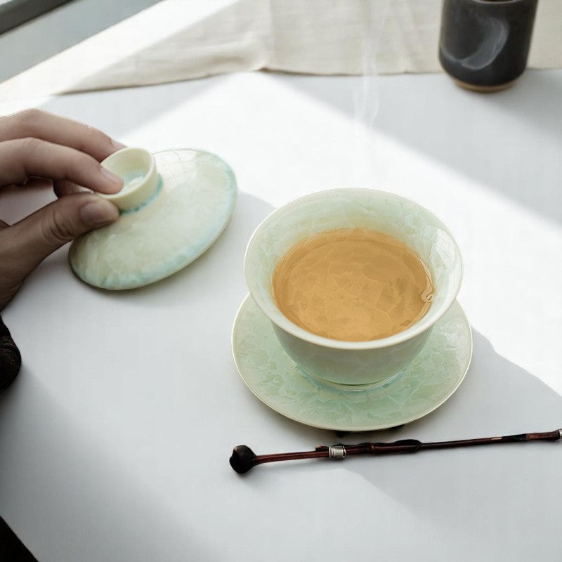 Crackled jade gaiwan with soft glaze reflection