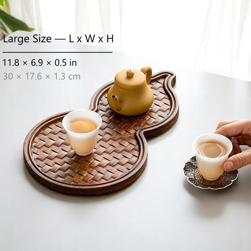Large hulu bamboo tray with yellow teapot and teacup in sunlight