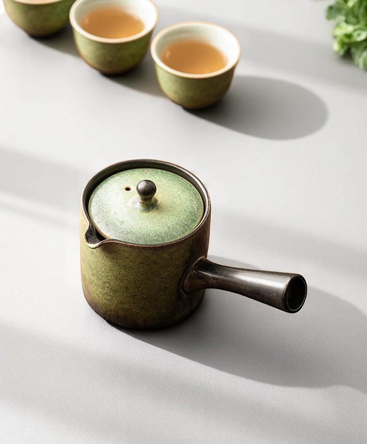 Green kyusu teapot with matching teacups, Japanese tea moment