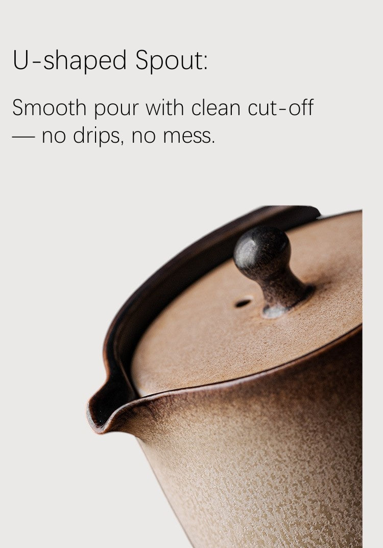 U-shaped spout for smooth pour, detail of ceramic teapot