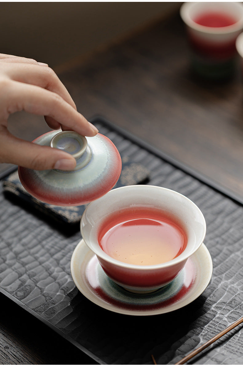 and holding aurora storm gaiwan during gongfu tea preparation