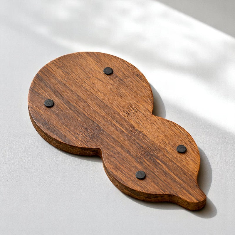 Underside of bamboo hulu tray showing anti-slip pads