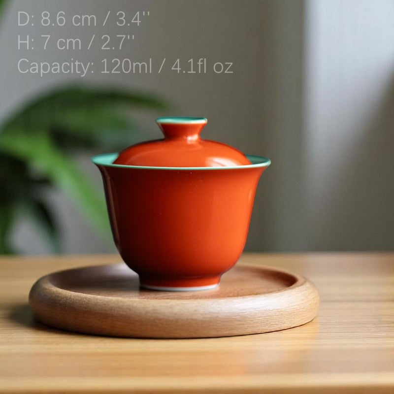 Pouring from red and green gaiwan with easy grip and clean spout