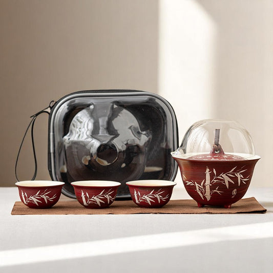 Complete red gongfu tea set with transparent carrying case, gaiwan, fairness pitcher, 3 teacups, and tea cloth