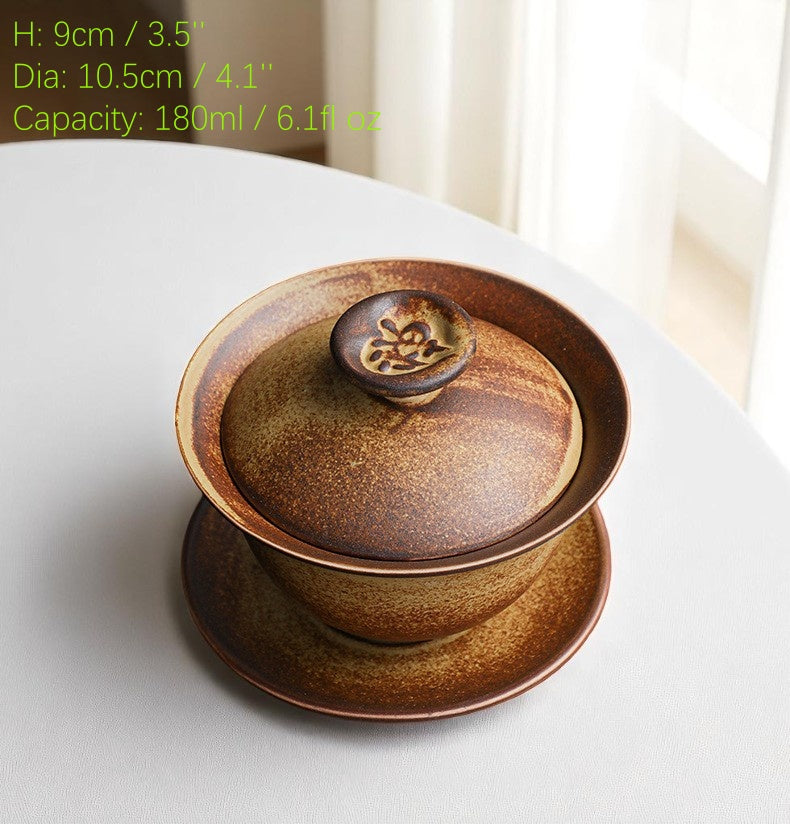 Brown ceramic container with lid on a white surface, showing dimensions and capacity.